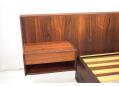 Built in bed side tables with single drawer. Beautiful rosewood used