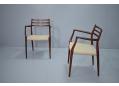 Stunning pair of vintage chairs with the elegant and slender frame in Rio-rosewood
