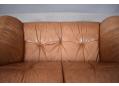 Mottled brown leather upholstered Danish small frame sofa by Skalma.