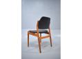 Danish dining chair in teak & black leather made by Sibast furniture. 