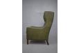 Classic wingback armchair in original green leather - view 5