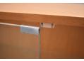 The cabinet is secured to the supports by double dowel locators.