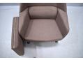 The seat cushion is fully upholstered and can be reversed for an even wear.