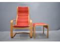 Matching footstool & high backed easy chair by Yngve Ekstrom.