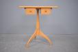 Candle table designed in America with solid ash timber construction.