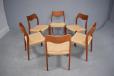 6 model 71 teak framed dining chairs with woven papercord  seats by Niels Moller.