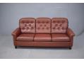 Classic Danish 3 seat sofa from mid 1970s with reddish brown colour leather and medium hight back