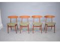 Set of 4 teak frame dining chairs with new upholstered seats 