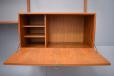 The drop front cabinet can be used to store a multitude of items. 