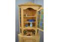 Corner cabinet in oak ideal for the corner of a kitchen or living room.