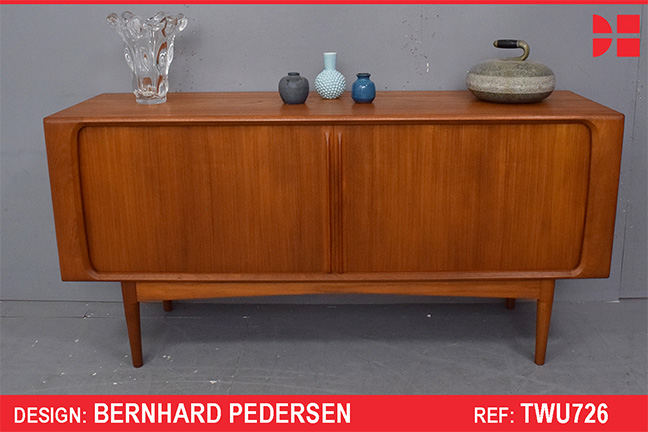 Small vintage teak sideboard with sliding doors