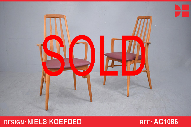 EVA carver chairs in Midcentury teak with burgundy vinyl | Niels Koefoed