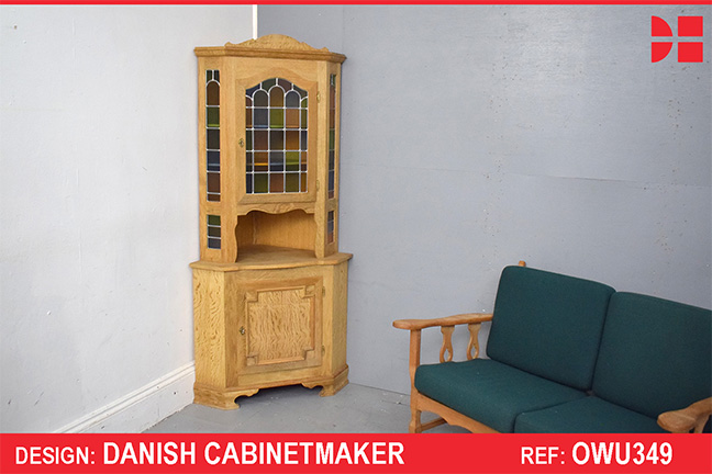 Antique oak corner cabinet with leaded glass door