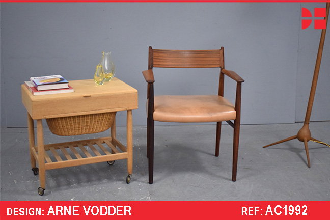 Arne Vodder vintage rosewood armchair with leather upholstery.