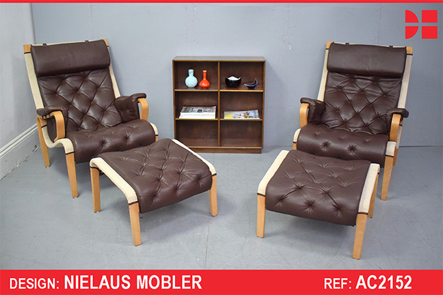 High-back brown leather armchair with footstool | Nielaus Mobler