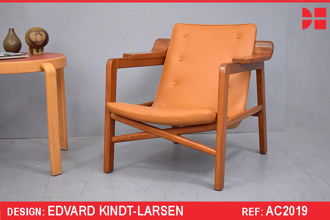 Stunning FIREPLACE chair in tan leather and cherry. Edvard Kindt Larsen design