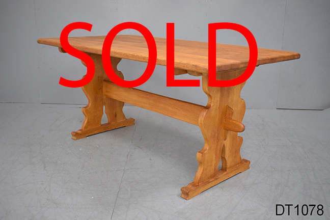 Solid oak plank table on trestle legs 