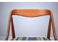 The curved back support is made of many layers of laminate. Strong & durable