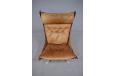 Vintage easy chair in brown leather and chrome frame designed by Sigurd Ressell