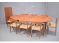 Sibast model 212 oval shaped dining table with 2 leaves.