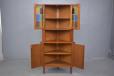 lost of storage in a space in the home that is often over looked. Fit a corner cabinet like this