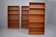 Lots of storage provided by teak bookcase only 34 inch w x 70 inch high