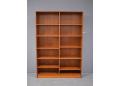 Midcentury vintage teak bookcase ideal for alcoves or smaller rooms.