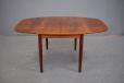 Vintage rosewood drop leaf dining table designed 1970s by Danish Cabinetmaker
