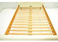 Beech slats span the bed frame to support the mattress.