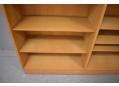Sloping edge shelves make them appear thinner than they are.