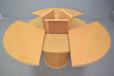 Butterfly extending round top dining table by skovby