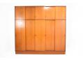 Very spacious vintage Danish wardrobe in teak. 5 sliding doors wide.  