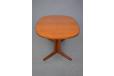 Oval top vintage teak dining table produced by Vejle stole and mobelfabrik