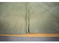 Green fabric upholstered 2 seat curved back sofa in beech.