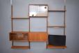 Wall mounted storage / display system designed in 1953 by Prebend sorensen in vintage teak