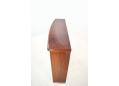 Gently curved front display cabinet in rosewood made by SKOVBY