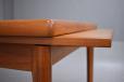 Midcentury teak dining table with hidden draw leaves  - view 6