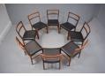 Johannes Andersen designed set of 8 dining chairs with rosewood frame. 