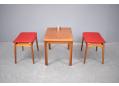 A pair of beautiful stools that will compliment most midcentury chairs.