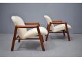 Midcentury armchairs with stylish frames, offering superb comfort and warmth
