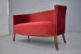 sleek 2 seater curved back sofa made by Danish Cabinetmaker in the 1940s