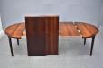 Vintage rosewood round top dining table extending with 3 extra leaves - view 10