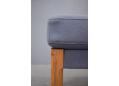 Round oak leg foot stool in blue fabric upholstery. Arne Vodder design.