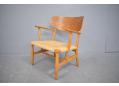 Stylish scandianavian armchair with oak frame and varnished finish
