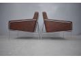 Brown leather upholstered armchair designed by Arne Jacobsen for Fritz Hansen