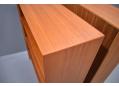 Adjustable shelving for narrow Danish made bookcase in teak.