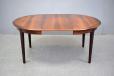 Danish design round dinign table in vintage rosewood etending with 3 extra leaves