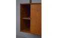 Modular wall mounted storage system in teak designed by Poul Cadovius - view 10