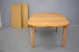 light oak dining table with 2 extra leaves produced by Nyrup Mobelfabrik