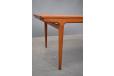 Vintage teak dining table with 2 pull out leaves designed by Johannes Andersen